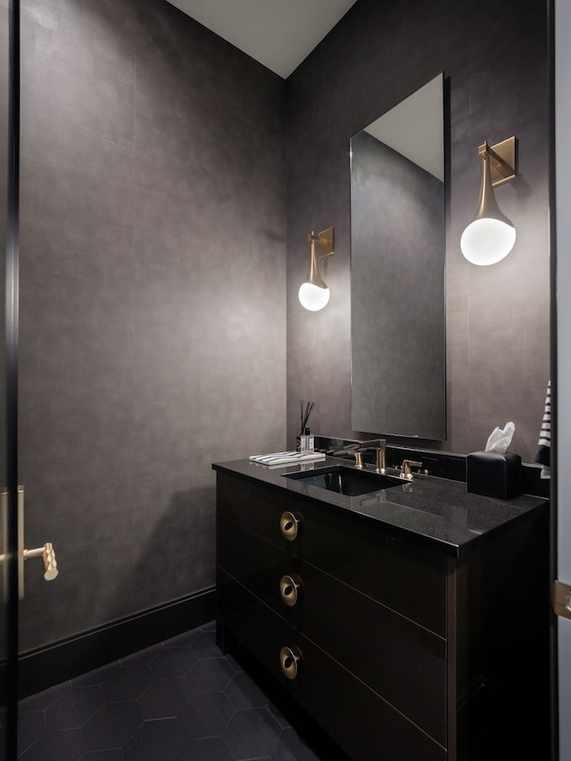 bathroom with tile patterned flooring and vanity