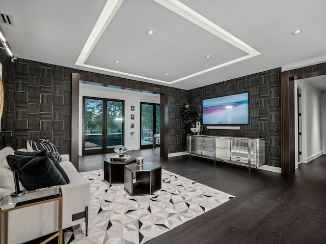 living room with dark hardwood / wood-style flooring