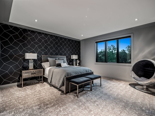 bedroom featuring carpet flooring and crown molding