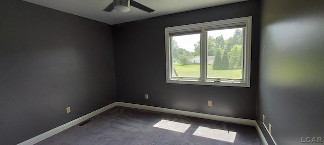 empty room featuring ceiling fan