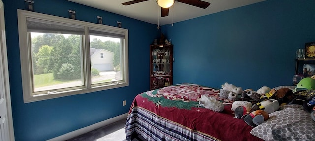 bedroom featuring ceiling fan