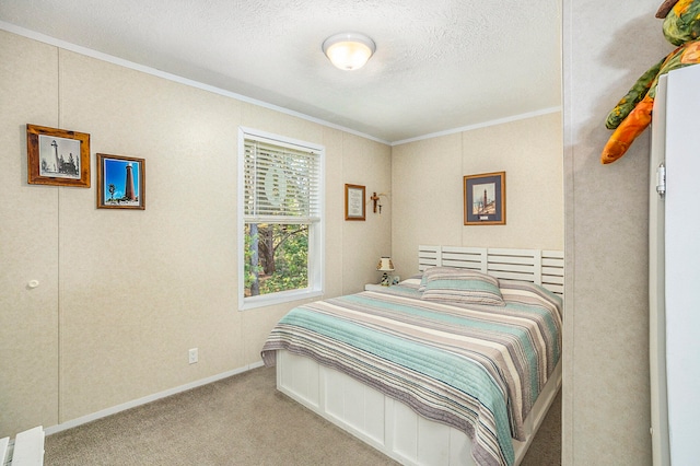 carpeted bedroom with a textured ceiling and crown molding