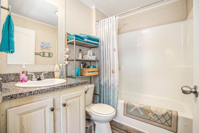 full bathroom featuring vanity, crown molding, toilet, shower / tub combo with curtain, and wood-type flooring