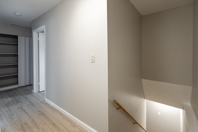 corridor featuring light hardwood / wood-style floors