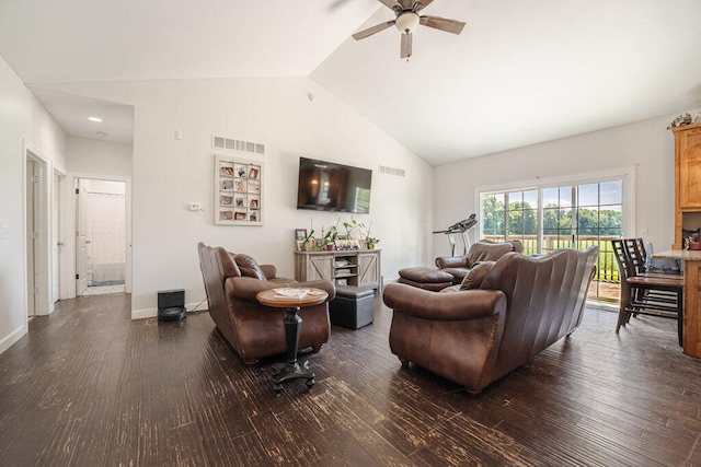 living room featuring ceiling fan, dark wood-type flooring, and high vaulted ceiling