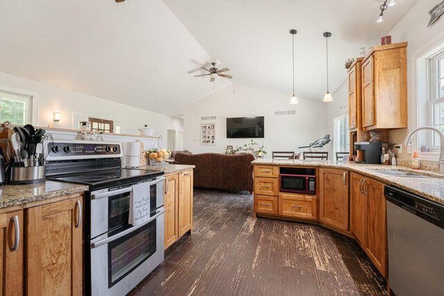 23381 Fosdick St, Dowagiac, MI 49047 - kitchen featuring appliances with stainless steel finishes, a sink, a peninsula, a ceiling fan, and dark wood-style floors