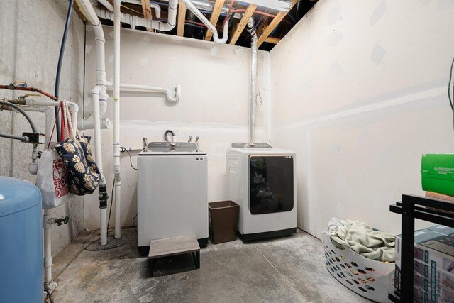 23381 Fosdick St, Dowagiac, MI 49047 - unfinished below grade area with separate washer and dryer and a water pressure tank