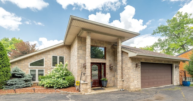 view of front of property featuring a garage