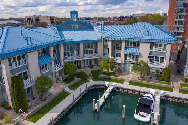 rear view of house with a water view