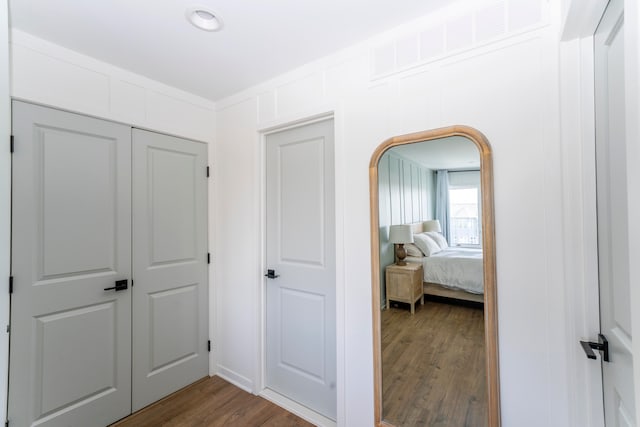 hall featuring wood-type flooring