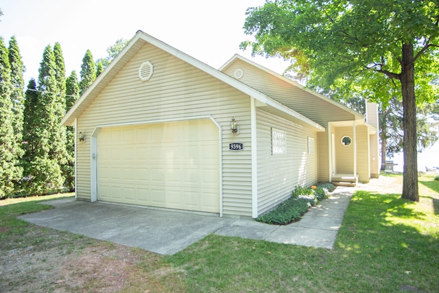 garage featuring driveway