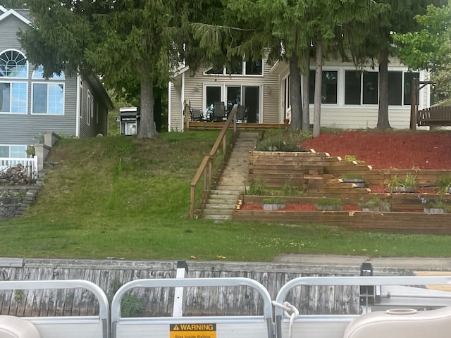 view of yard featuring stairway