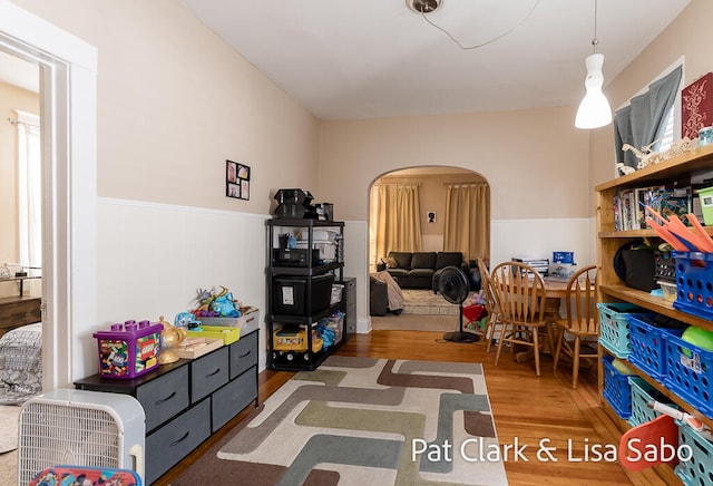 playroom with dark hardwood / wood-style flooring