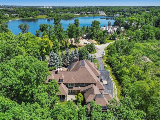 drone / aerial view with a water view