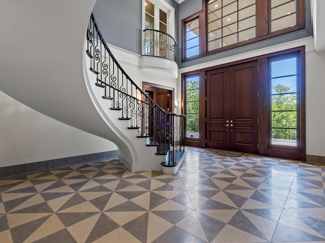 entryway featuring a high ceiling