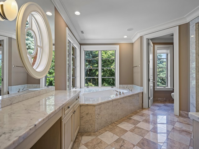 bathroom with toilet, a wealth of natural light, ornamental molding, and tiled tub