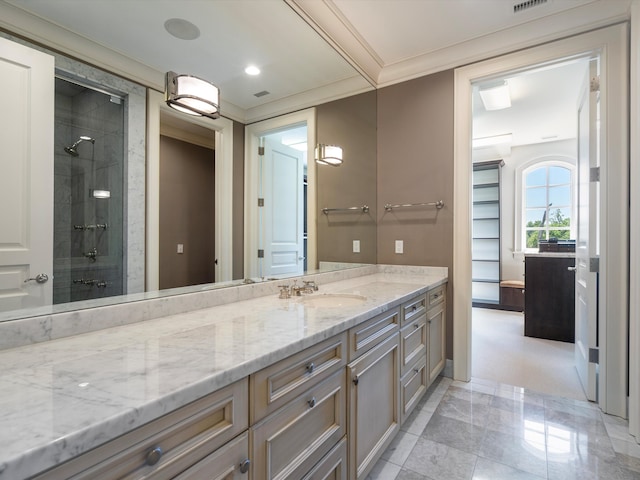 bathroom featuring vanity and a shower with door