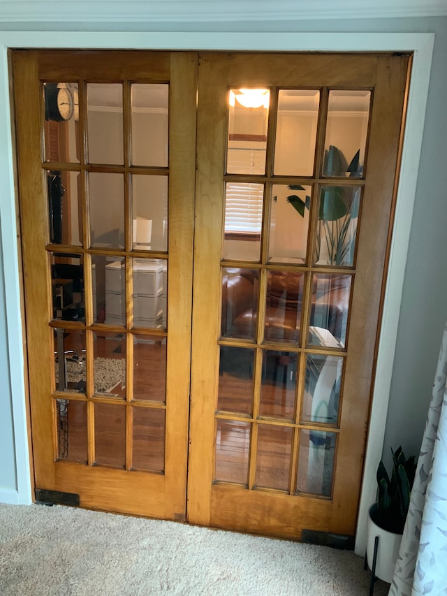 room details with carpet and french doors