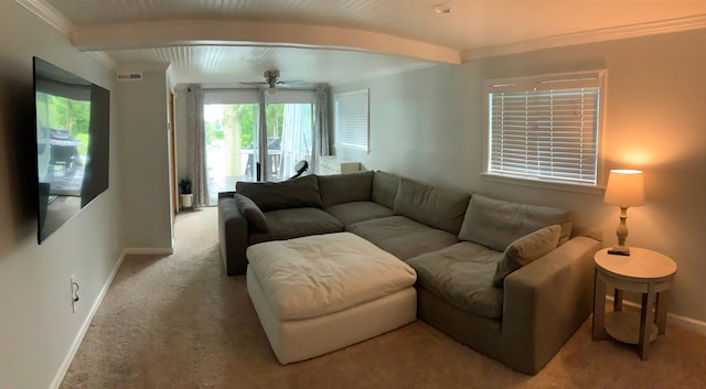 living room with beamed ceiling, ceiling fan, and ornamental molding