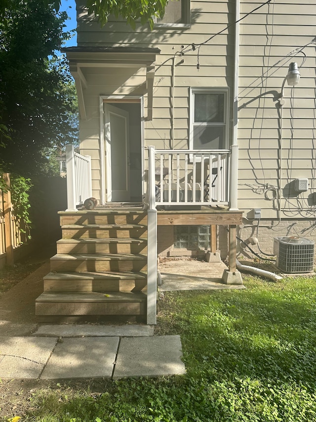 doorway to property with cooling unit