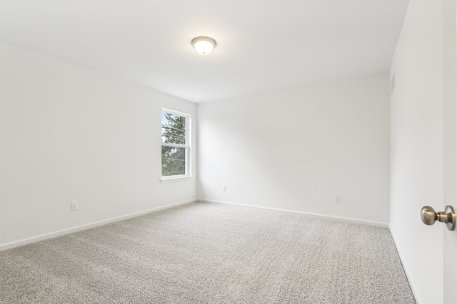 spare room with carpet flooring