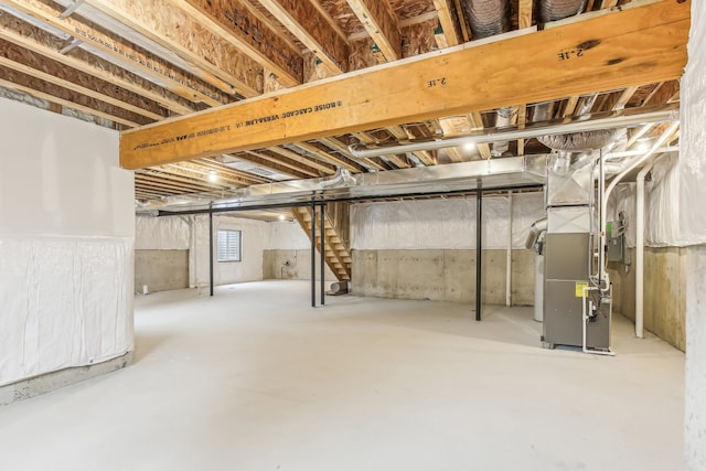 basement featuring heating unit