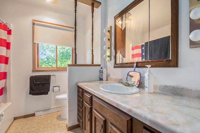 bathroom featuring vanity, toilet, and a baseboard radiator