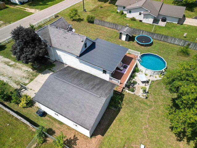 515 Locust St, Howard City, MI 49329 - aerial view of property and surrounding area with a pool