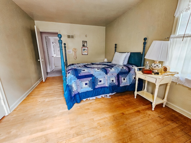 bedroom featuring light hardwood / wood-style floors