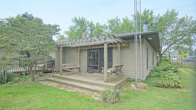 back of property featuring a pergola, a yard, and a deck