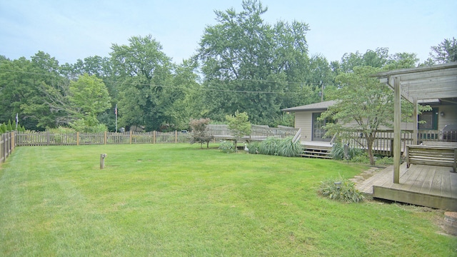 view of yard with a pergola and a wooden deck