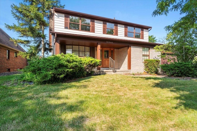 view of front of home featuring a front yard