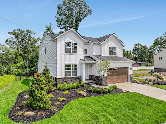 modern farmhouse with a garage and a front yard