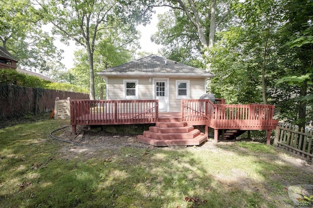 4241 Echo Cv, Manitou Beach, MI 49253 - back of house featuring a deck and roof with shingles