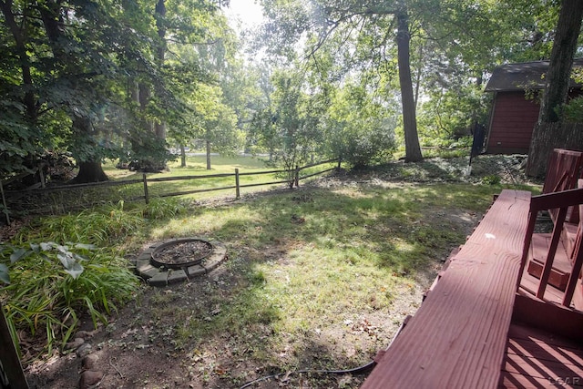 view of yard with a wooden deck