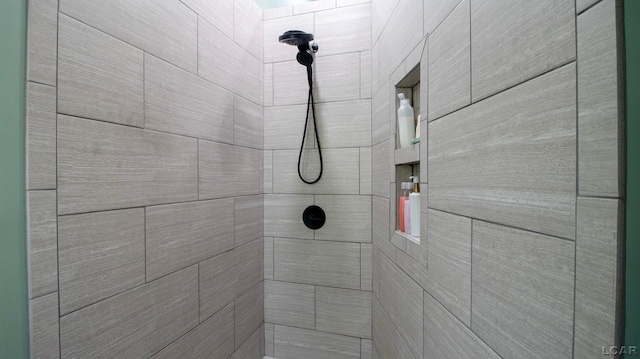 room details with a tile shower