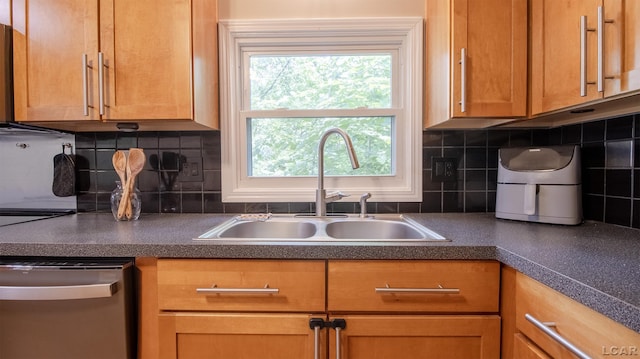 4241 Echo Cv, Manitou Beach, MI 49253 - kitchen featuring dishwasher, a sink, dark countertops, and backsplash