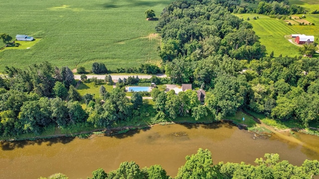 birds eye view of property with a rural view and a water view