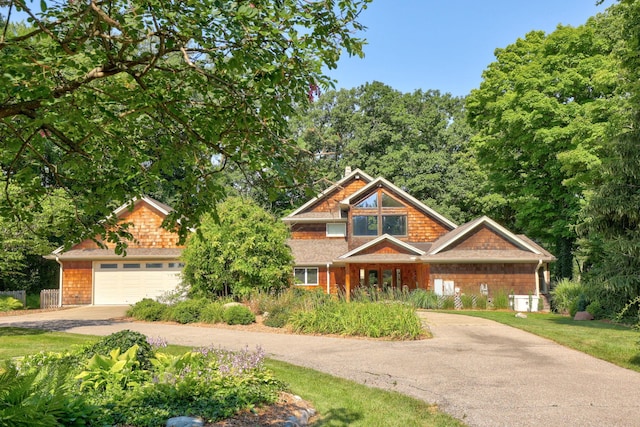 craftsman house featuring a garage