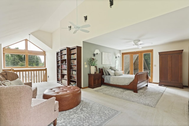 bedroom with light carpet, french doors, ceiling fan, and high vaulted ceiling