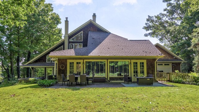 9300 Ormes Rd, Vassar, MI 49768 - back of house featuring french doors, a patio area, a chimney, and roof with shingles