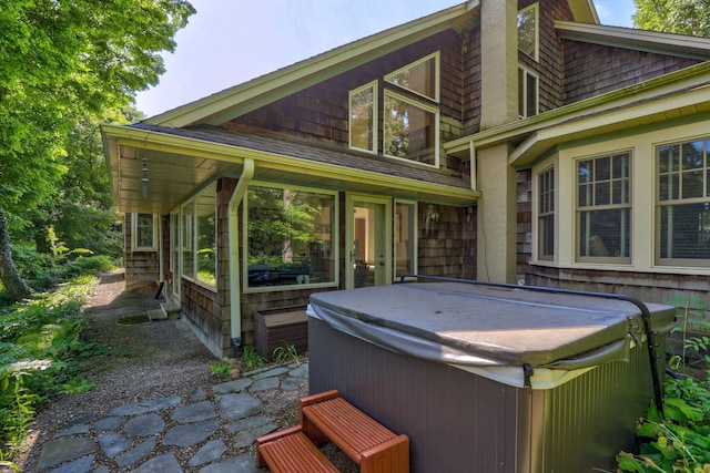 view of patio with a hot tub