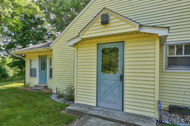 9300 Ormes Rd, Vassar, MI 49768 - doorway to property with a yard
