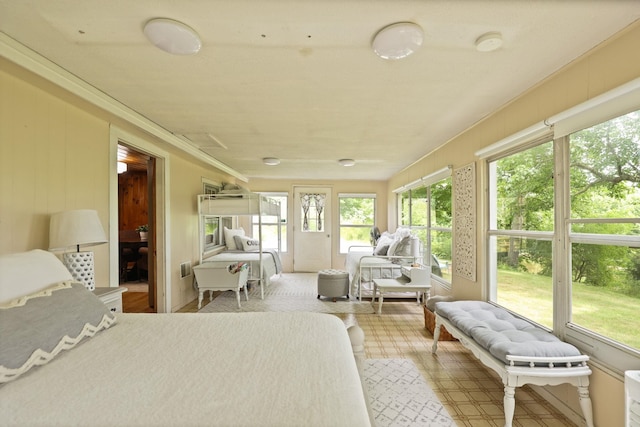 bedroom featuring multiple windows