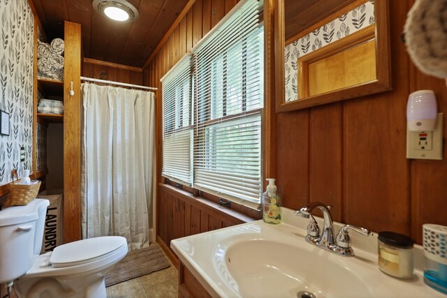 9300 Ormes Rd, Vassar, MI 49768 - bathroom featuring toilet, wooden walls, a sink, curtained shower, and wood ceiling