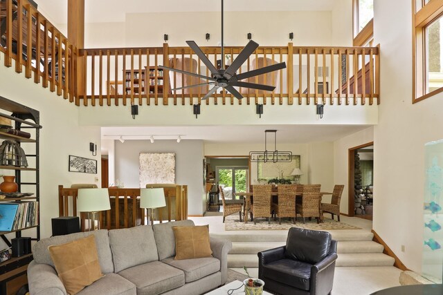 9300 Ormes Rd, Vassar, MI 49768 - living room with ceiling fan and a high ceiling