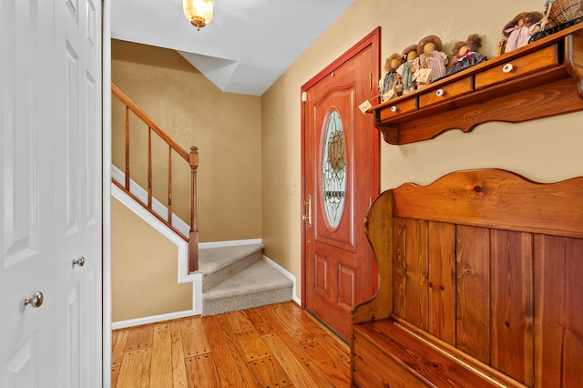 foyer entrance with light wood-type flooring