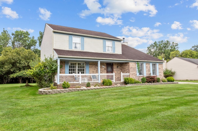 view of front facade featuring covered porch and a front yard