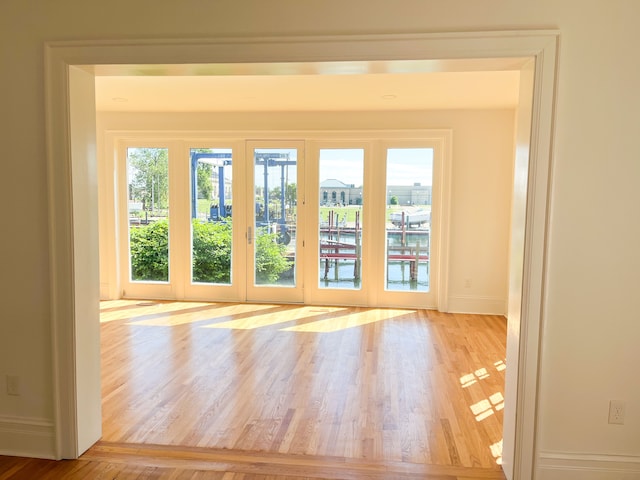 488 Parkview Dr, Detroit, MI 48214 - unfurnished room with baseboards and wood finished floors