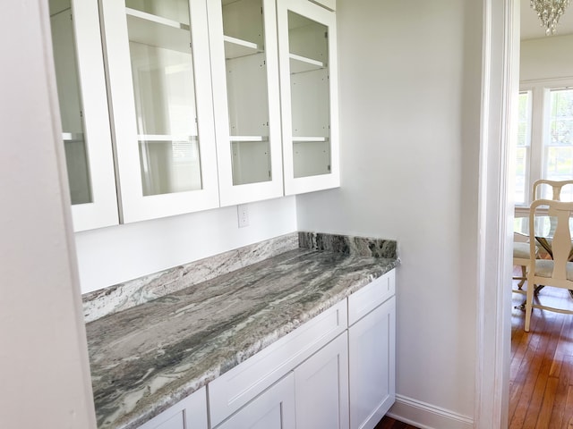 488 Parkview Dr, Detroit, MI 48214 - bar with dark wood-style flooring